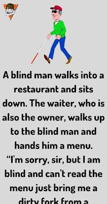 A blind man walks into a restaurant and sits down.